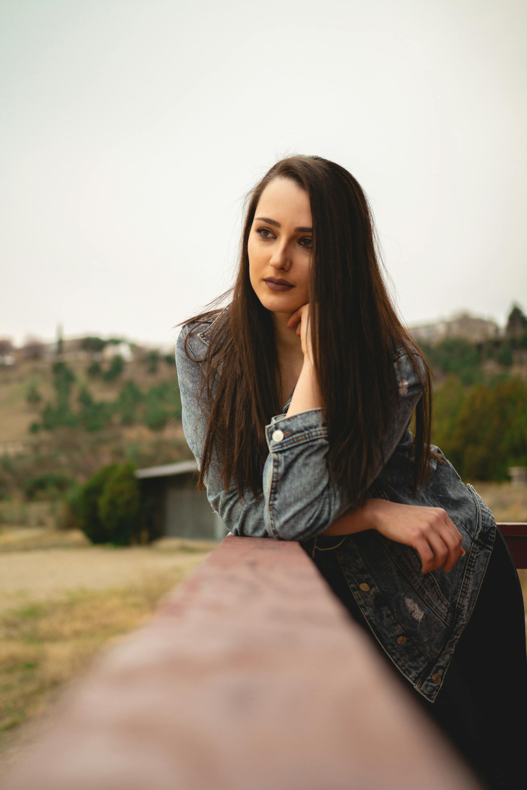 A Woman Wearing Denim Jacket